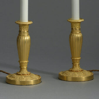 Pair of empire ormolu lamps
