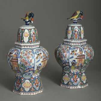 Pair of 19th century polychrome faience vases & covers