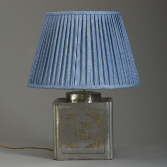 A polished brass inlaid pewter tea canister lamp