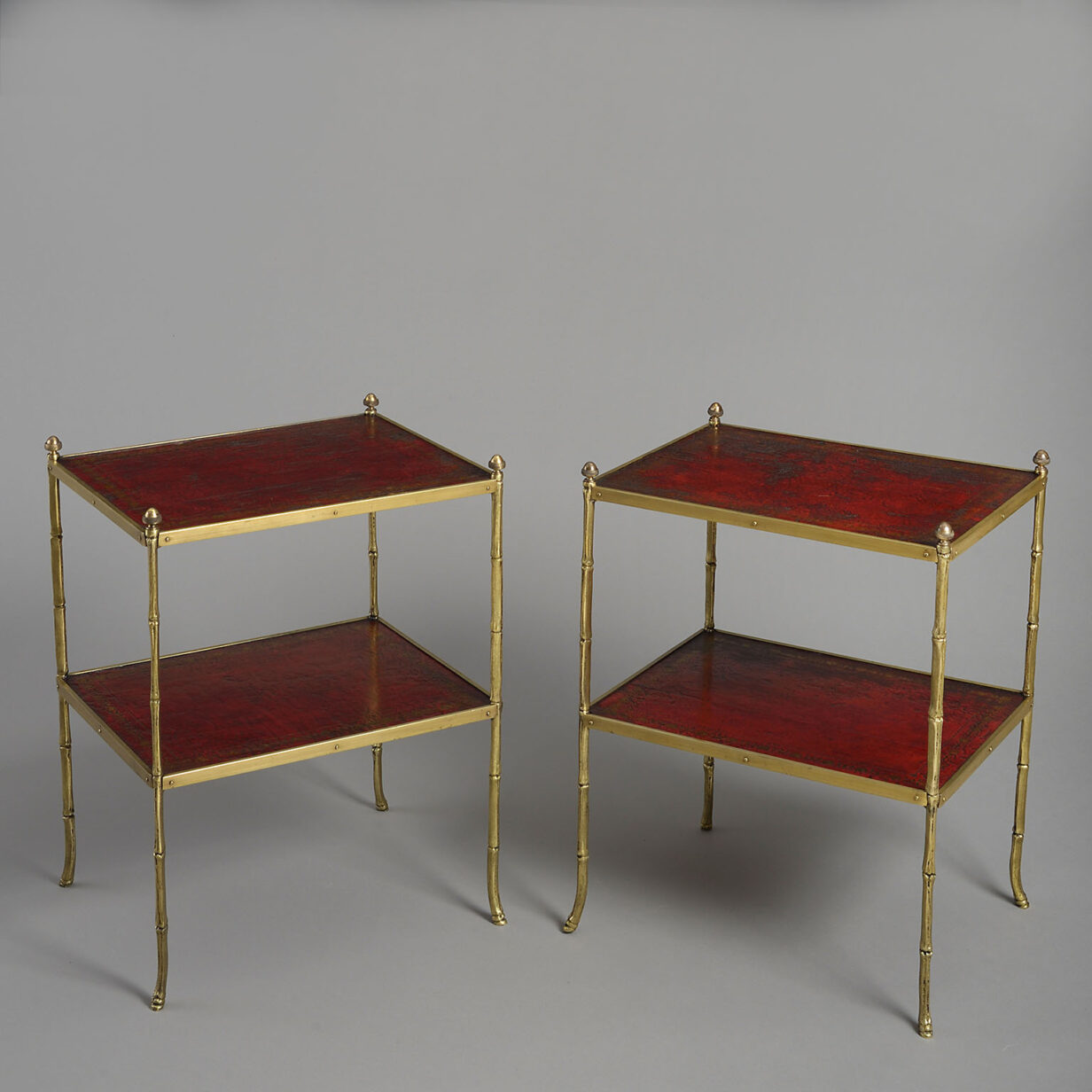Pair of mid-century two tier tables attributed to maison jansen