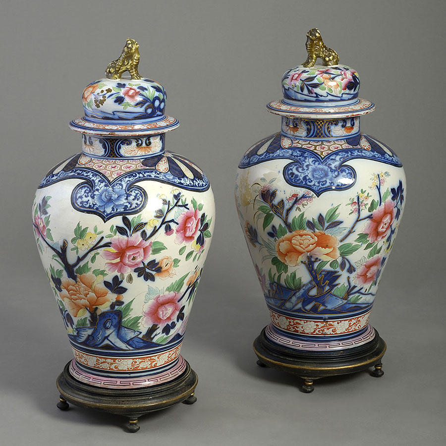 A pair of 19th Century Imari Style Faience Pottery Vases and Covers, French, circa 1830