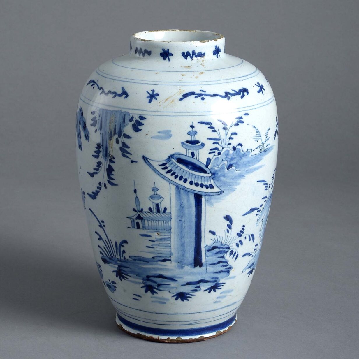 Late 18th century blue and white glazed delft pottery vase