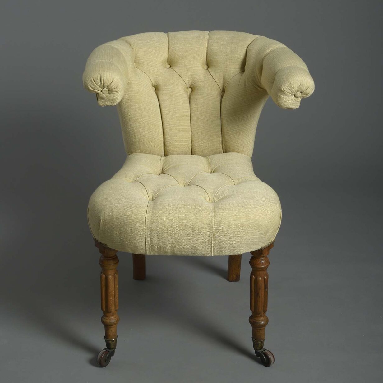 Early 19th century upholstered reading armchair