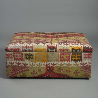 Early 20th century kilim covered ottoman stool