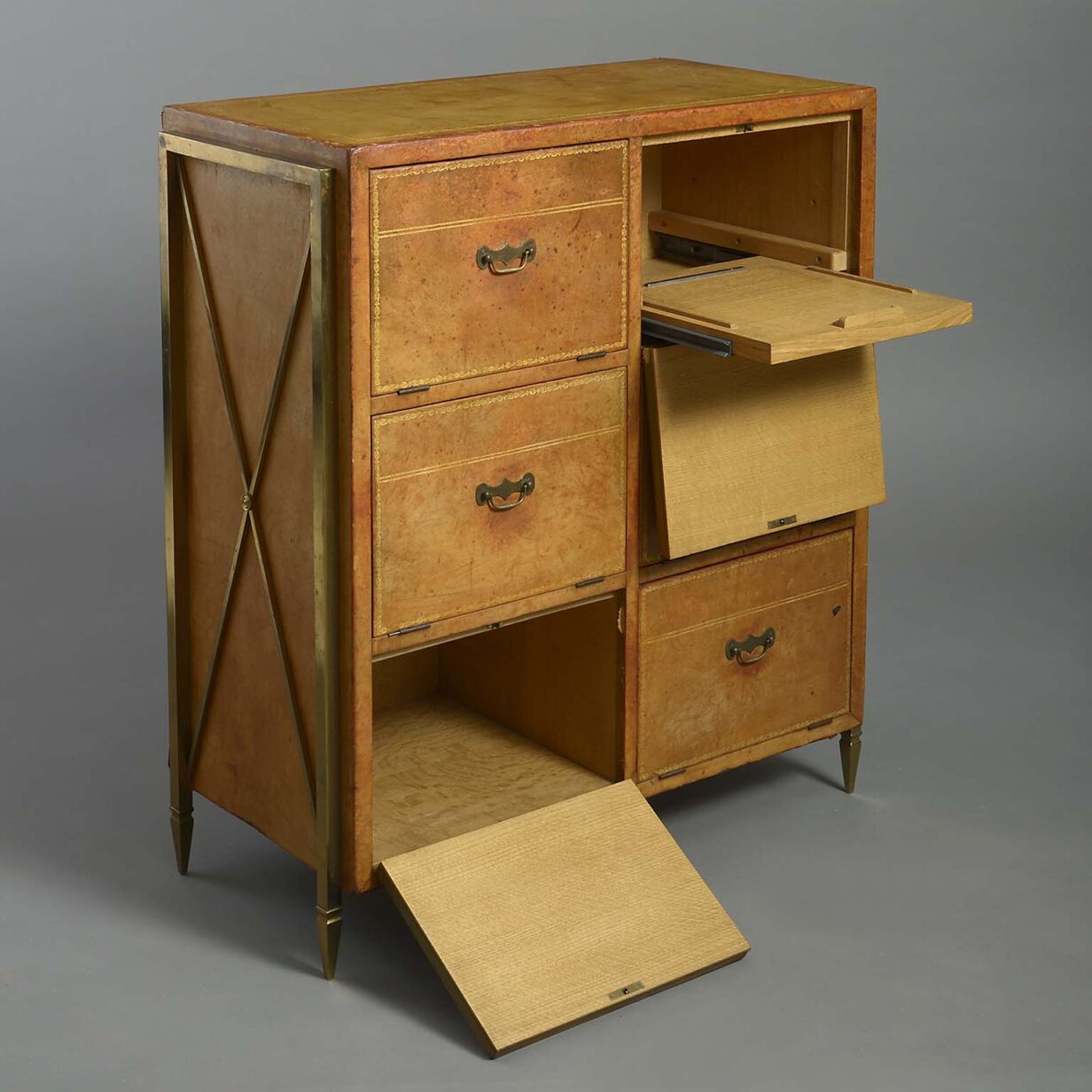 Mid-century leather and brass cartonnier attributed to maison jansen