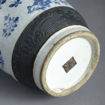 Tall blue and white glazed vase