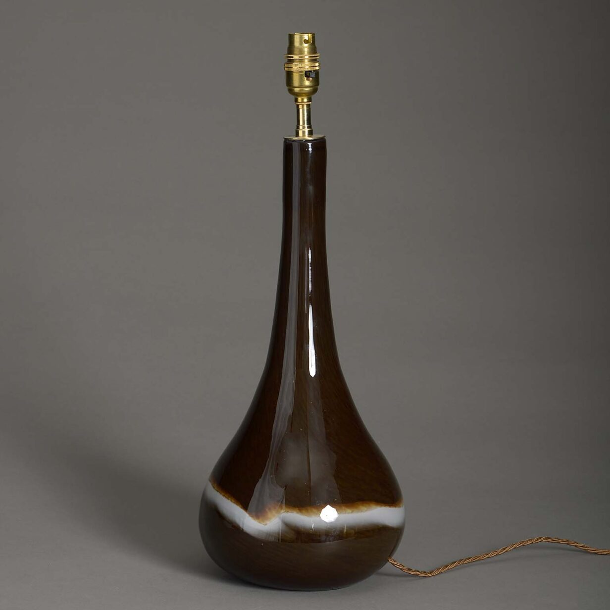 Mid-century dark glass bottle vase lamp