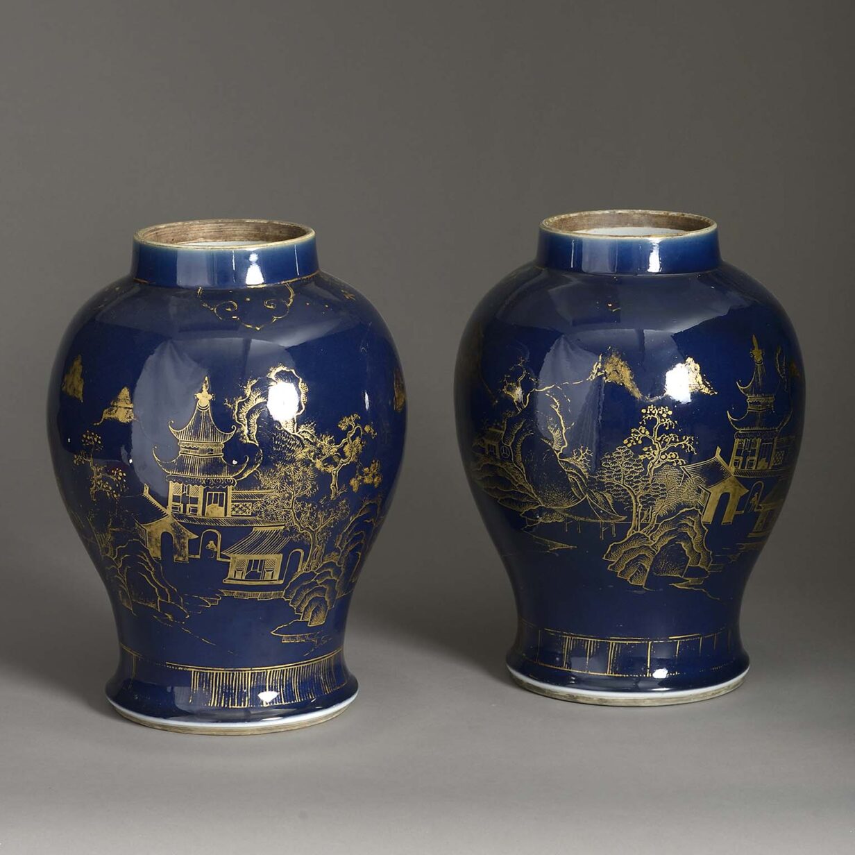 Pair of early 19th century blue and gilt glazed baluster porcelain vases