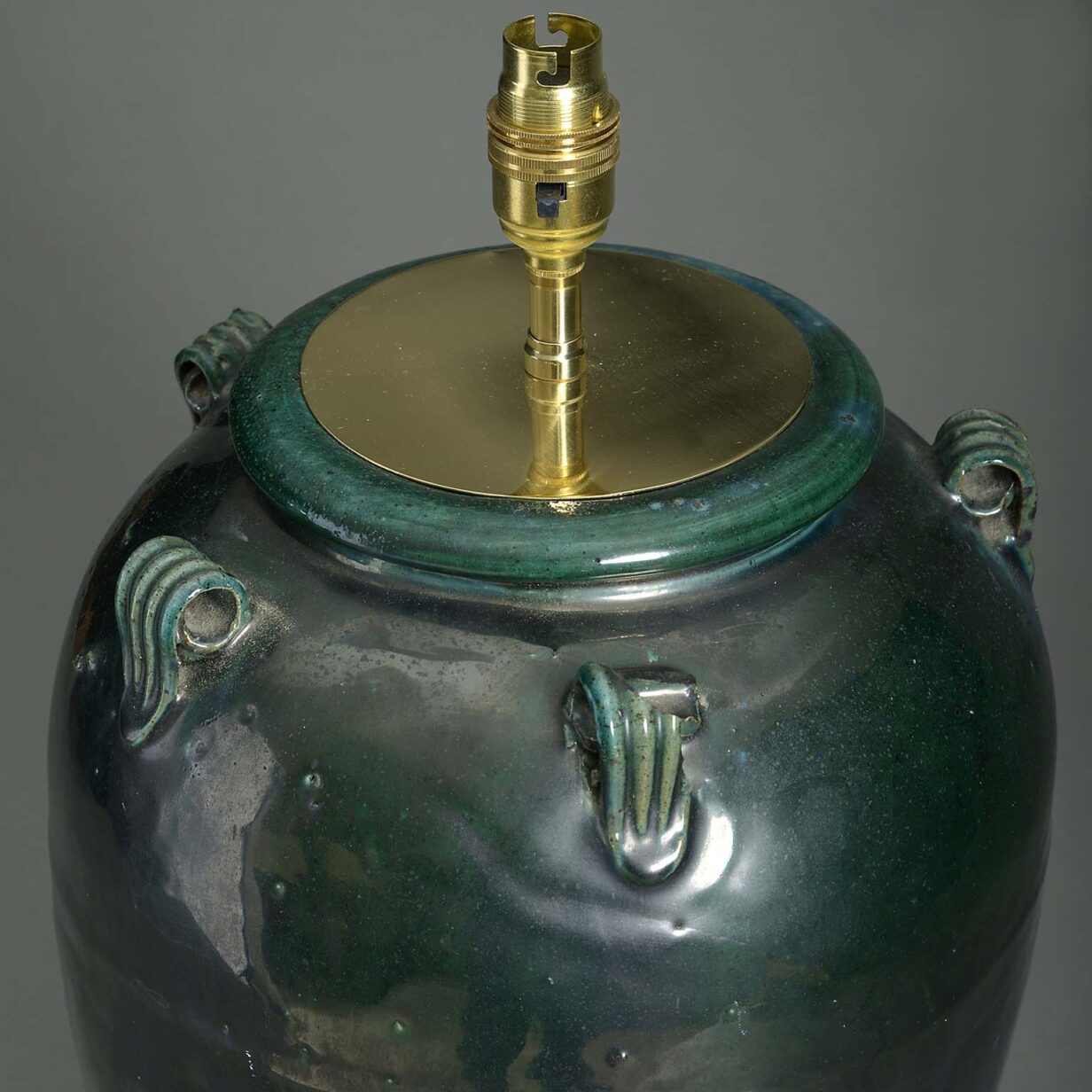 Green glazed pottery table lamp