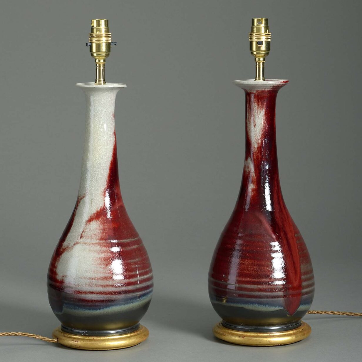 Pair of sang de boeuf vase lamps