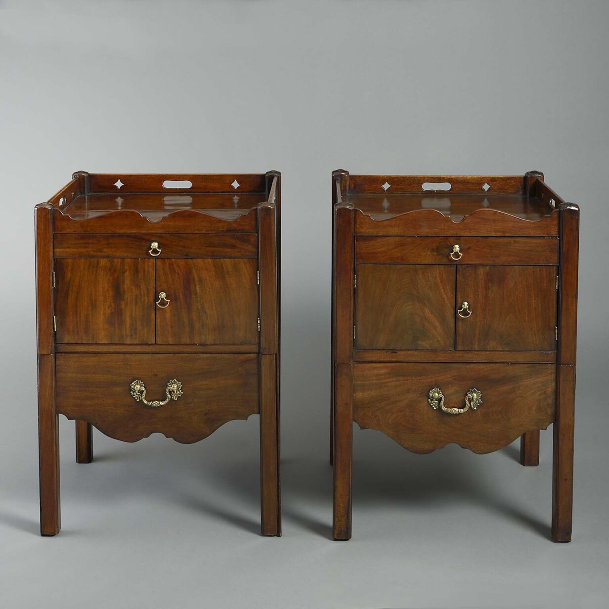 Pair of chippendale period bedside cabinets