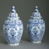 Pair of delft vases and covers