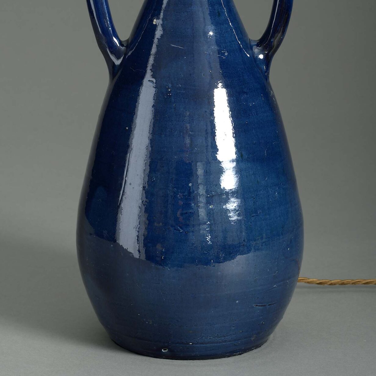 Blue glazed two-handled pottery vase lamp