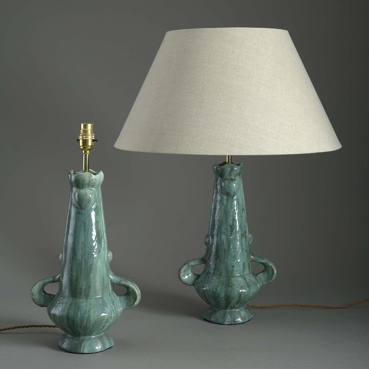 Pair of art nouveau pottery vase lamps
