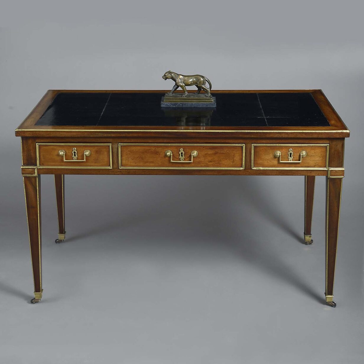 Louis xvi period mahogany and brass mounted writing table