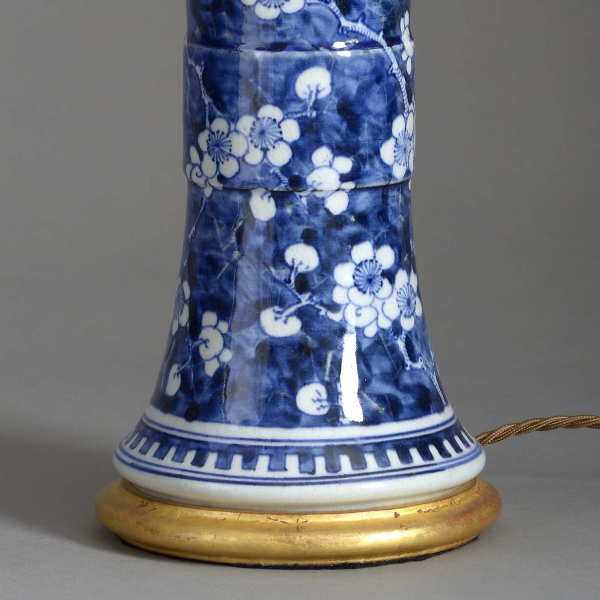 Pair of blue and white beaker vase lamps