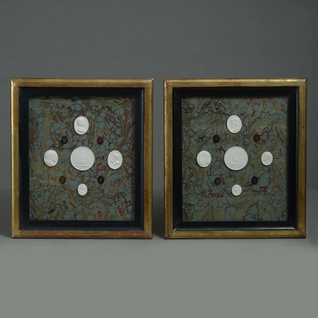 Pair of framed intaglio groups