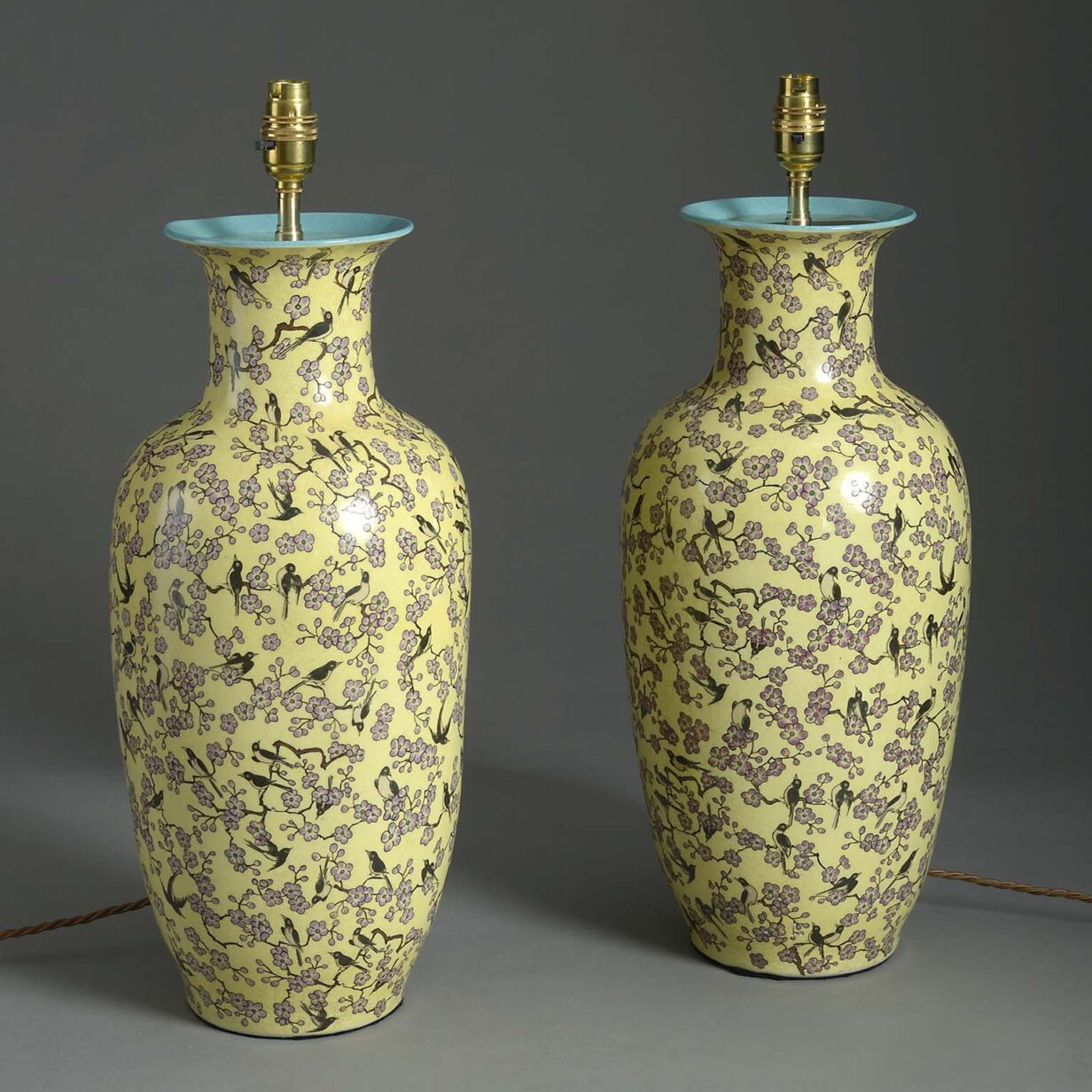 Large pair of yellow ground porcelain vase lamps