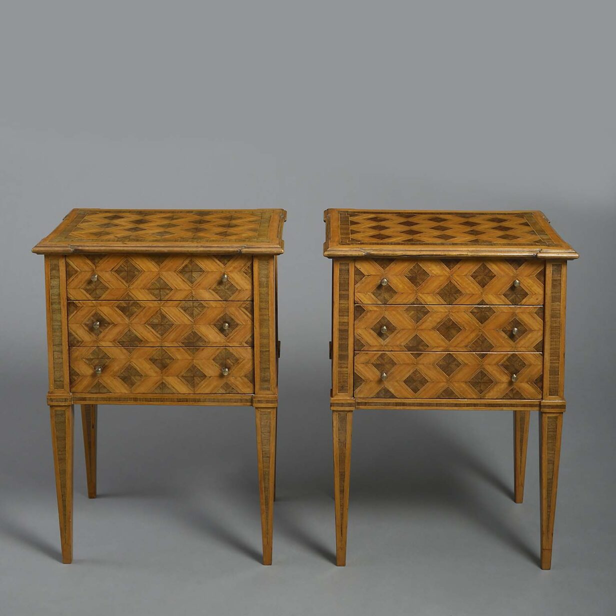Pair of parquetry bedside cabinets