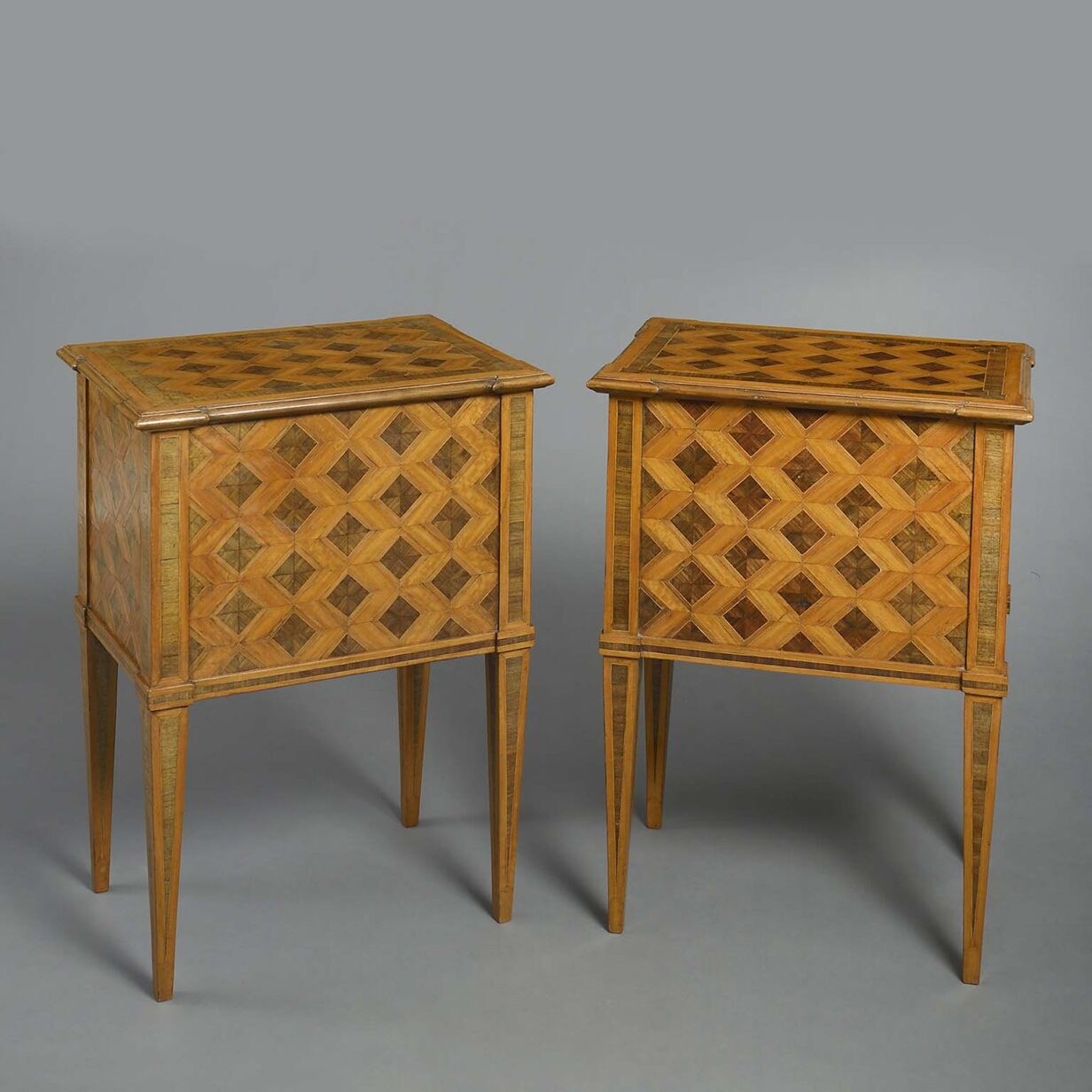 Pair of parquetry bedside cabinets