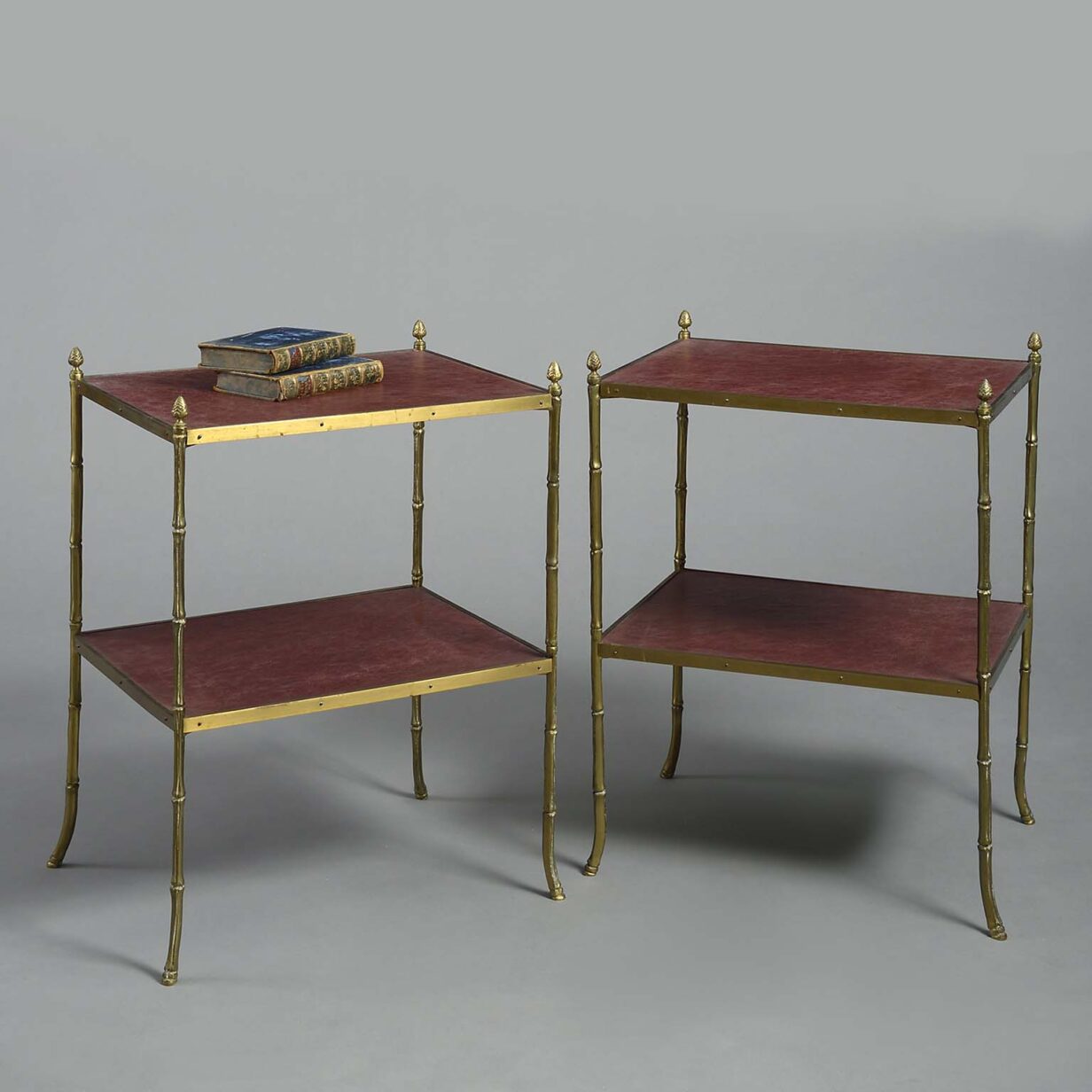 Pair of brass two tier tables