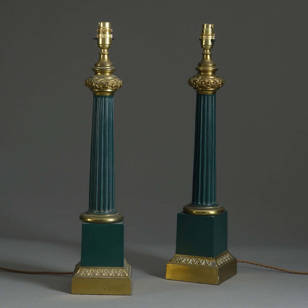 Pair of 19th century green tole and ormolu column lamps