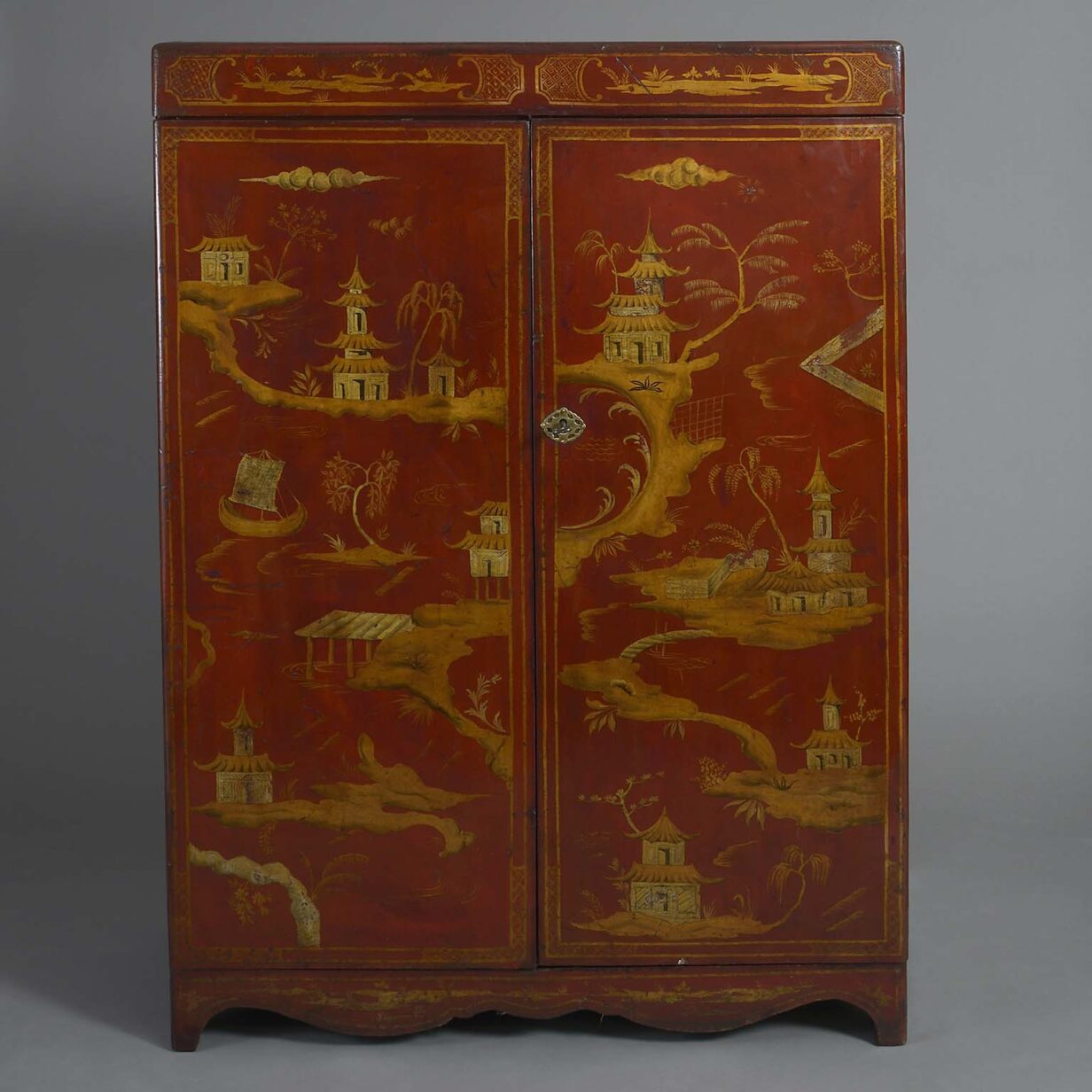 Mid-19th century red and gilt chinoiserie lacquer cabinet.