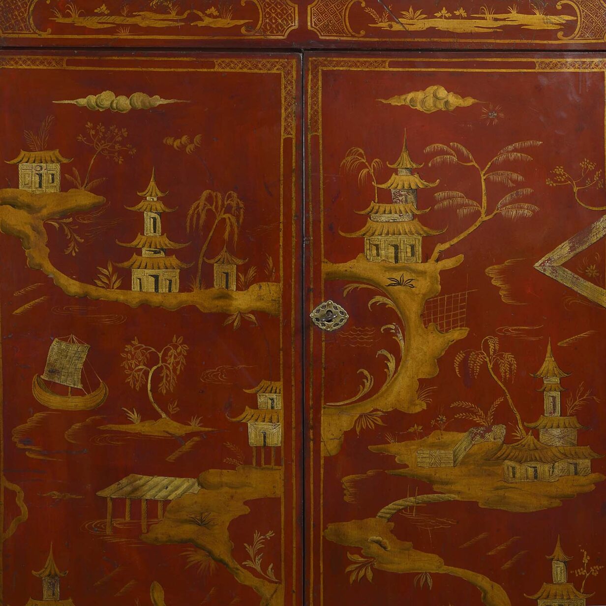 Mid-19th century red and gilt chinoiserie lacquer cabinet.