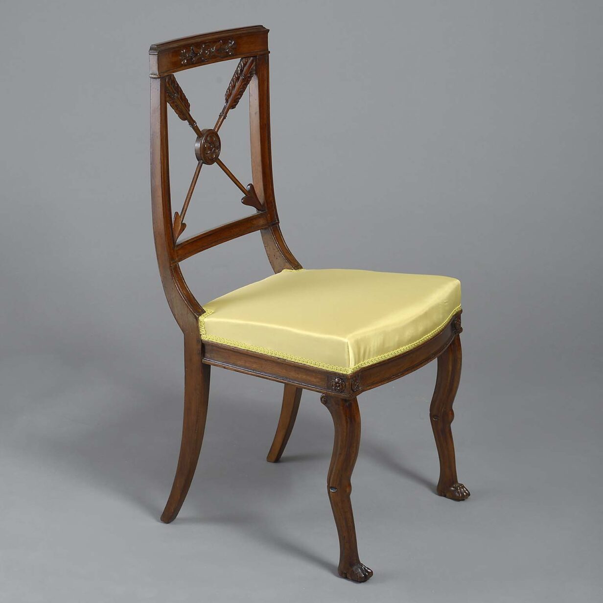 Twelve empire period mahogany dining chairs