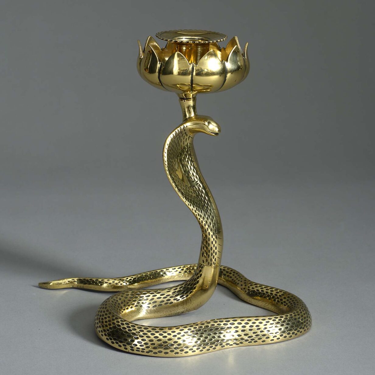 Pair of late 19th century brass serpent candlesticks