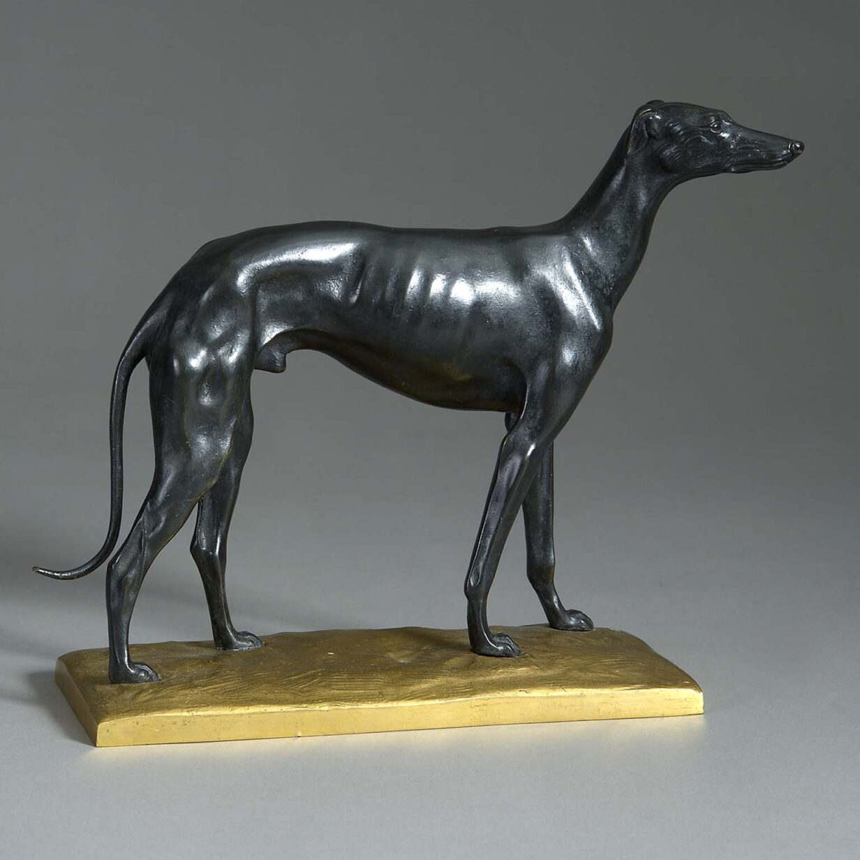 19th century bronze long dog upon an ormolu base