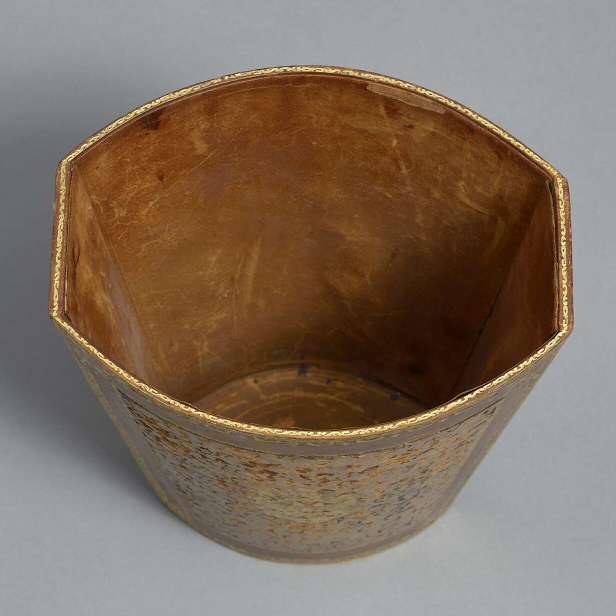 Mid-century tooled leather waste paper basket