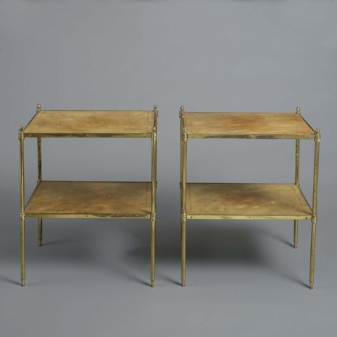Pair of green leather two tier tables