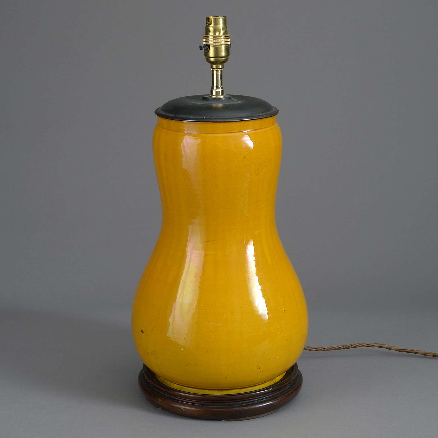 An ochre glazed antique vase lamp An ochre glazed antique vase lamp